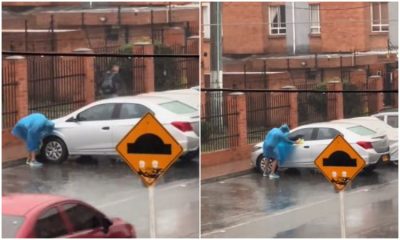 ¡Video! Bogotano creativo se vuelve viral al aprovechar el aguacero para lavar su carro